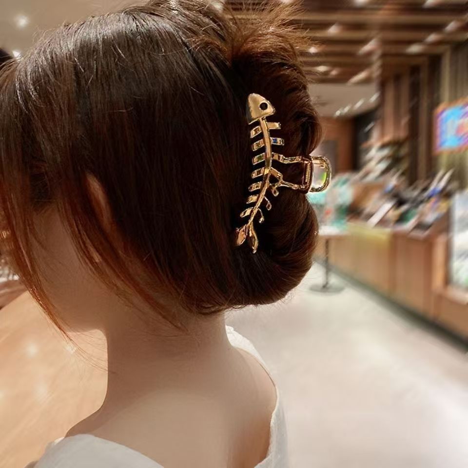 Golden Tide Fishbone Hair Claw