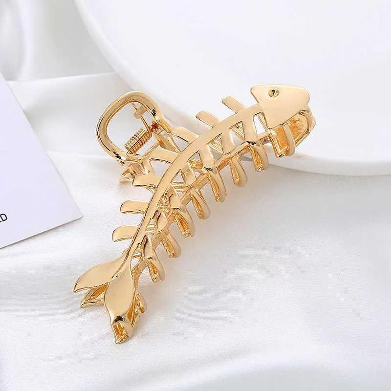 Golden Tide Fishbone Hair Claw