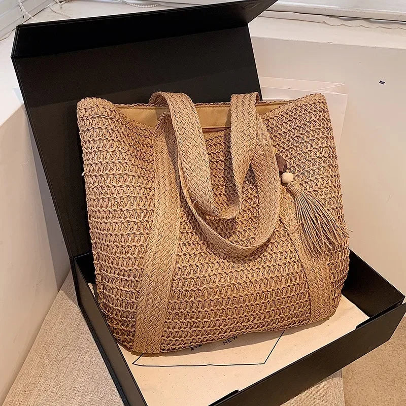 Straw woven tote bag for coastal cowgirl beach vacation outfits