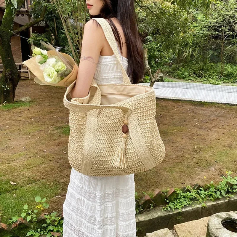 Straw woven tote bag for coastal cowgirl beach vacation outfits
