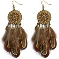 Feather tassel earrings for coastal cowgirl vacation and beach-to-bonfire outfits