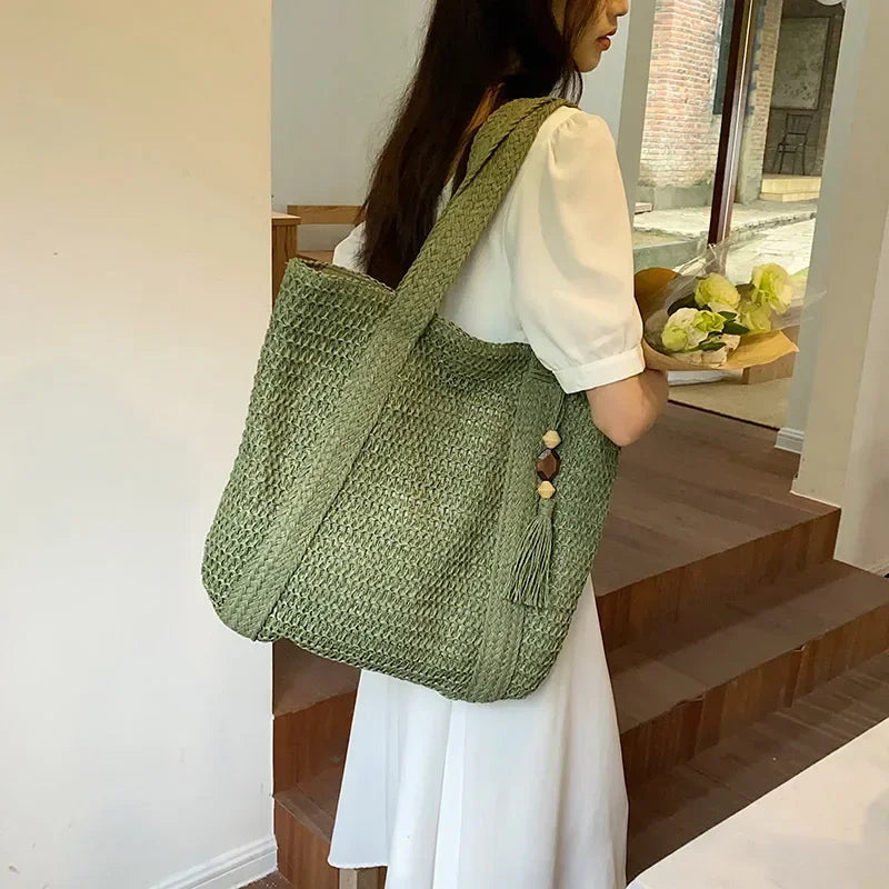 Straw woven tote bag for coastal cowgirl beach vacation outfits