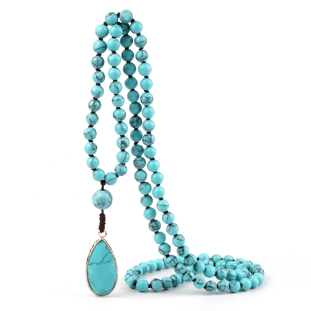 Blue bead necklace with water-drop pendant look for coastal cowgirl styling