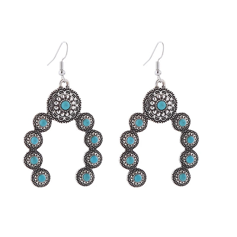 Turquoise-look statement earrings for western coastal cowgirl outfits