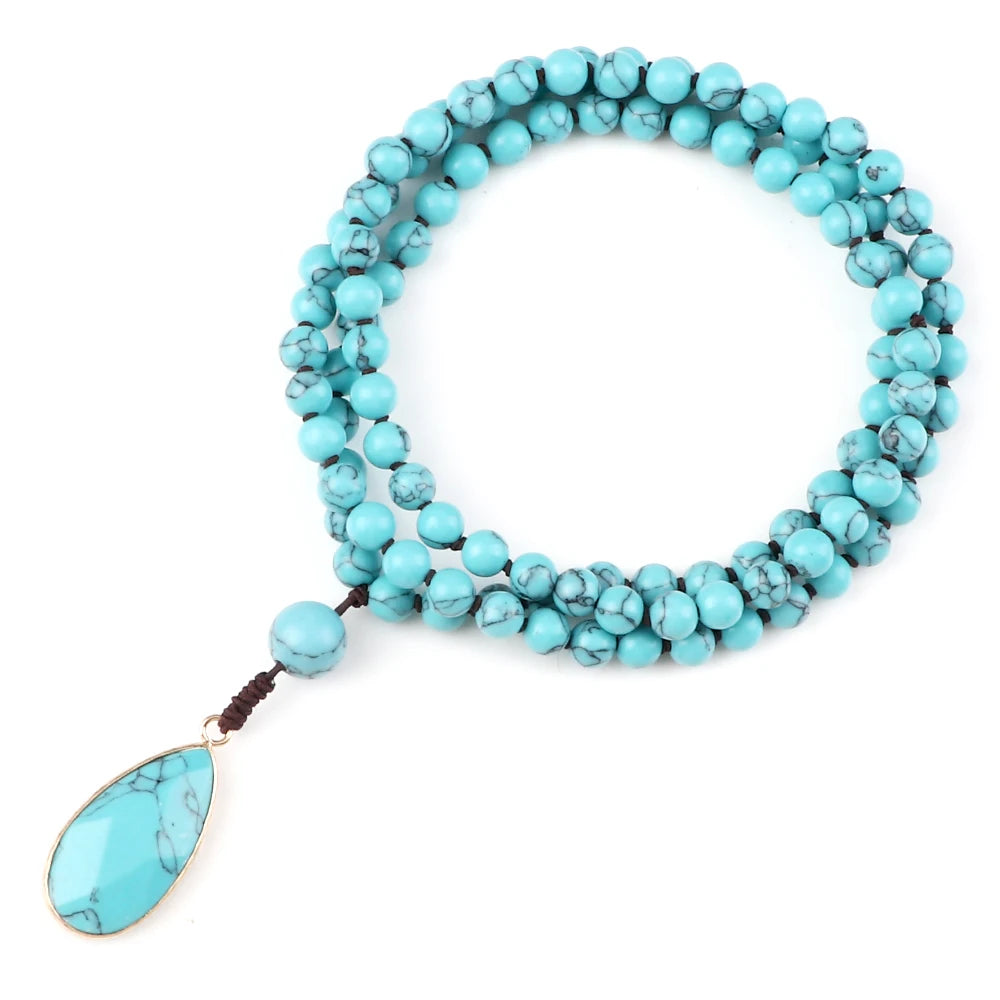 Blue bead necklace with water-drop pendant look for coastal cowgirl styling