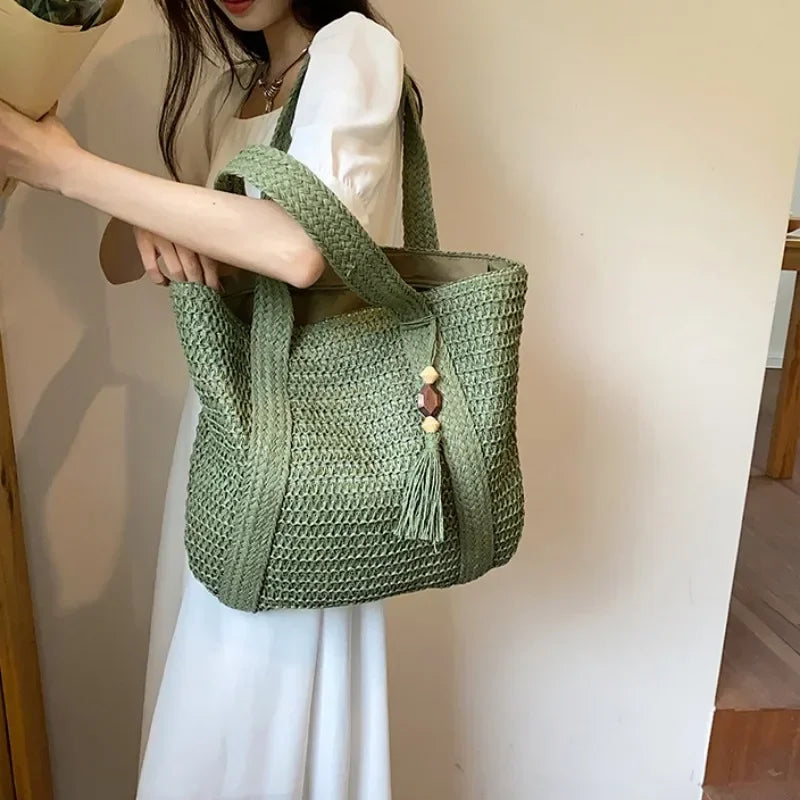 Straw woven tote bag for coastal cowgirl beach vacation outfits