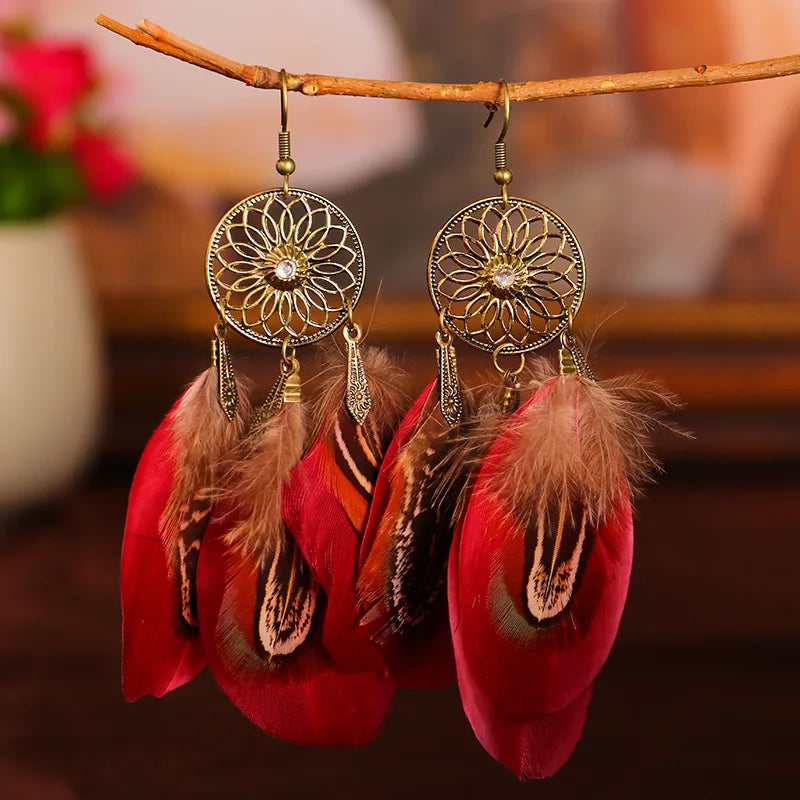 Feather dangle earrings styled for boho western coastal cowgirl outfits