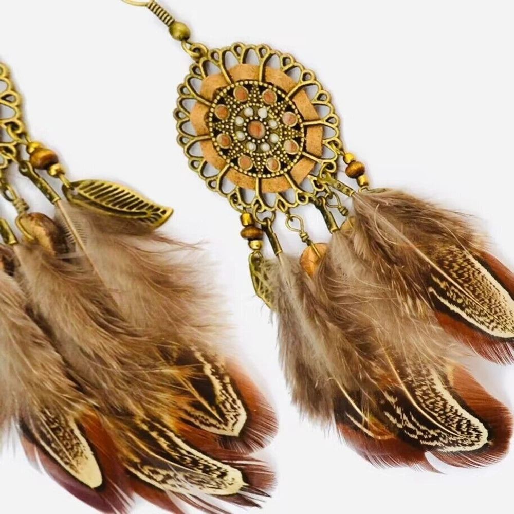 Feather tassel earrings for coastal cowgirl vacation and beach-to-bonfire outfits