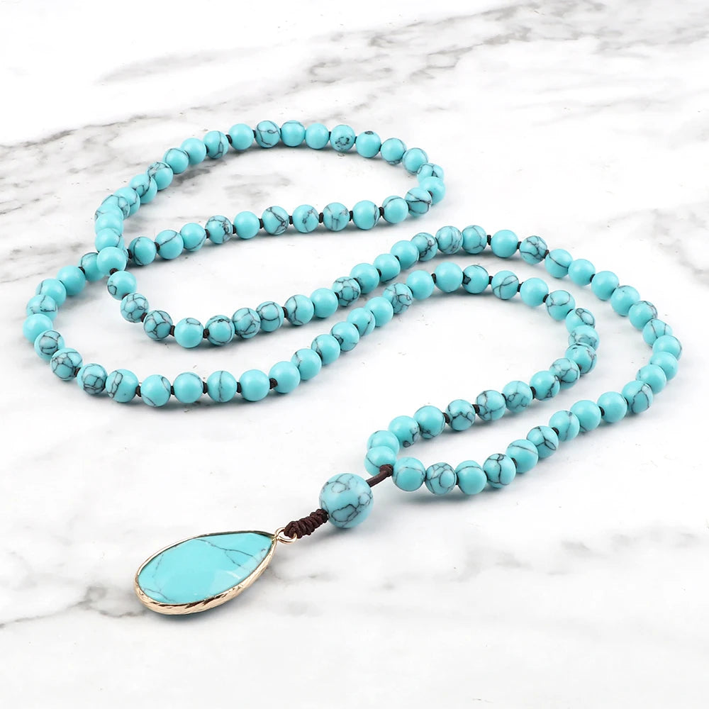 Blue bead necklace with water-drop pendant look for coastal cowgirl styling